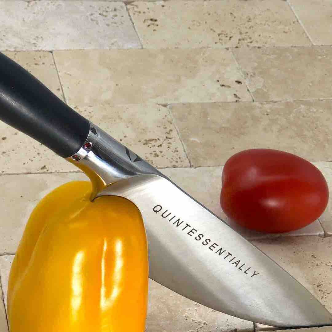https://www.craftstoneknives.com/wp-content/uploads/2021/11/8-Inch-Chef-Knife-with-an-Ebony-Hardwood-Handle-and-Garnet-Gemstones-copy-2.jpg